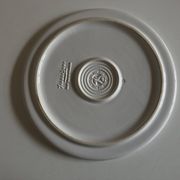 White glazed earthenware potter's trivet