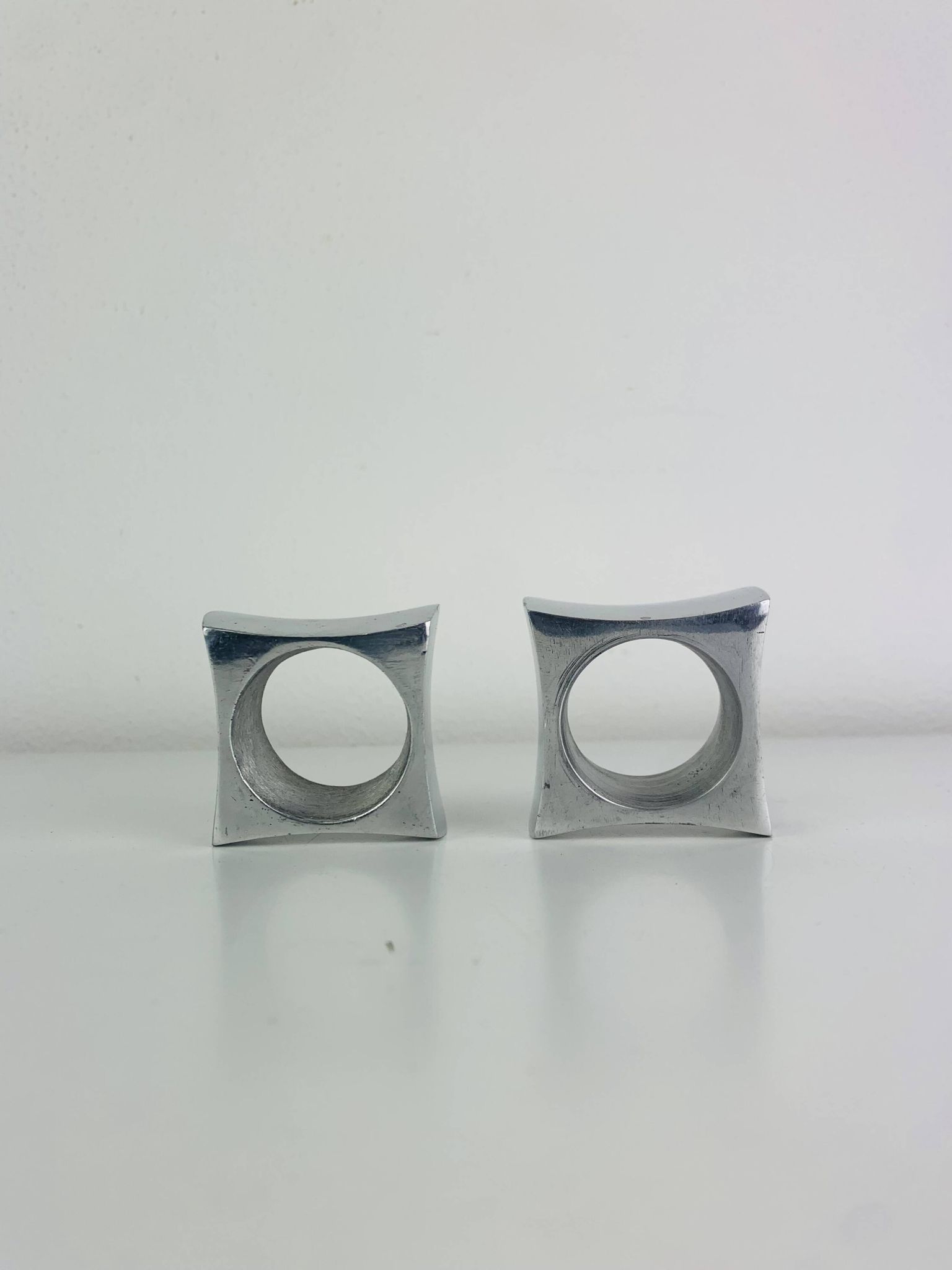 Pair of egg cups or space age napkin rings in aluminium, 1970s.