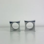 Pair of egg cups or space age napkin rings in aluminium, 1970s.
