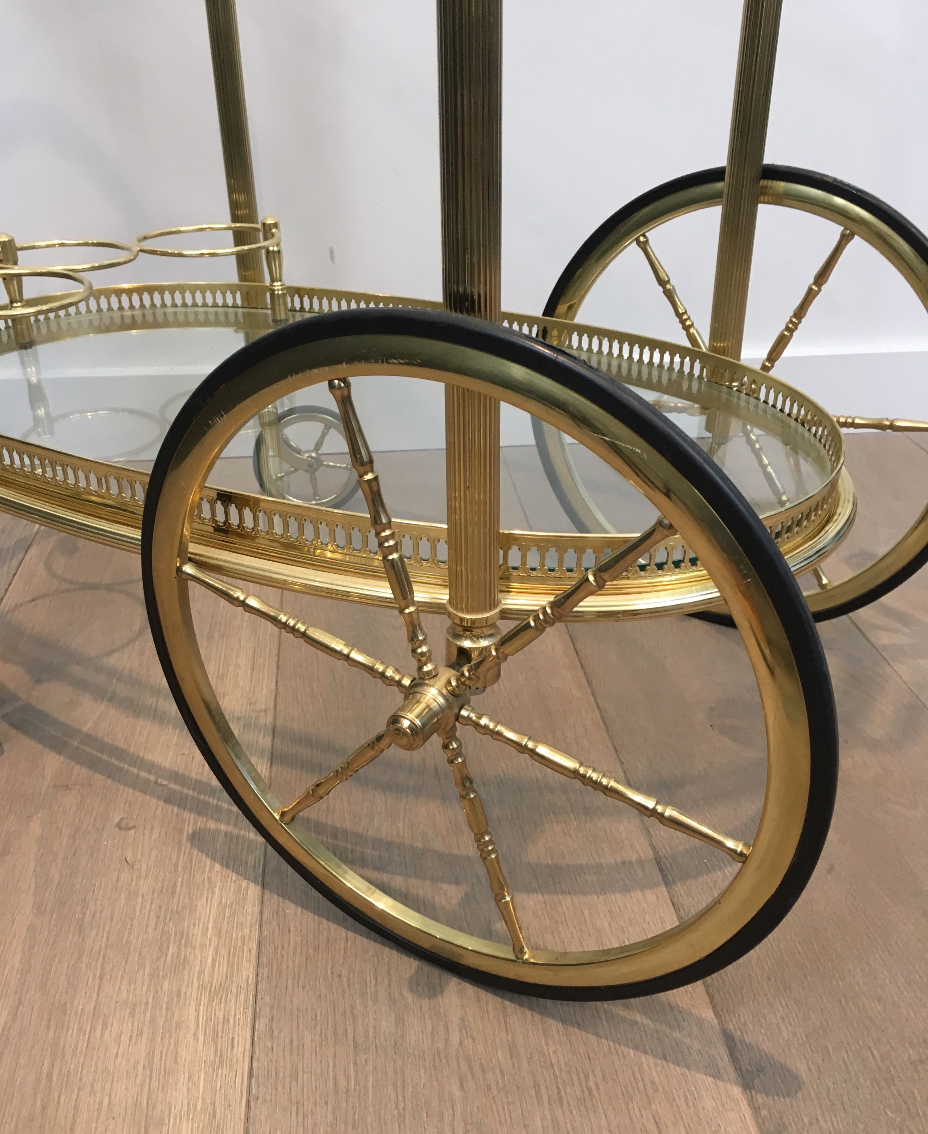 Oval brass trolley from Maison Baguès.