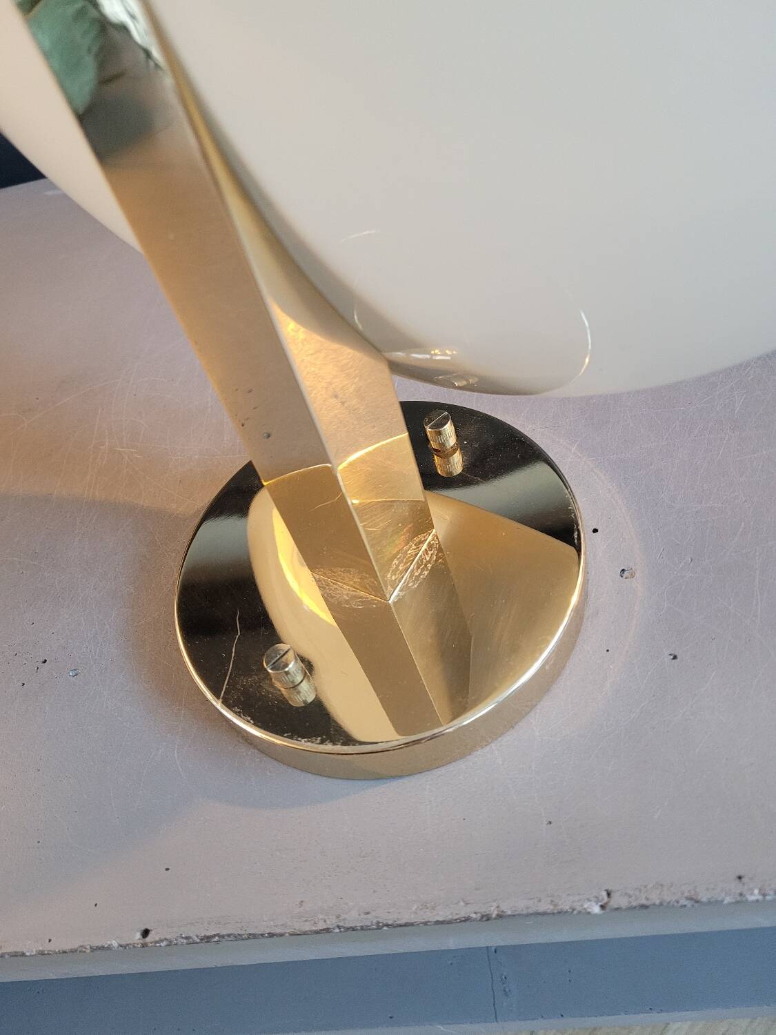 Gold and cream white saucer wall sconce