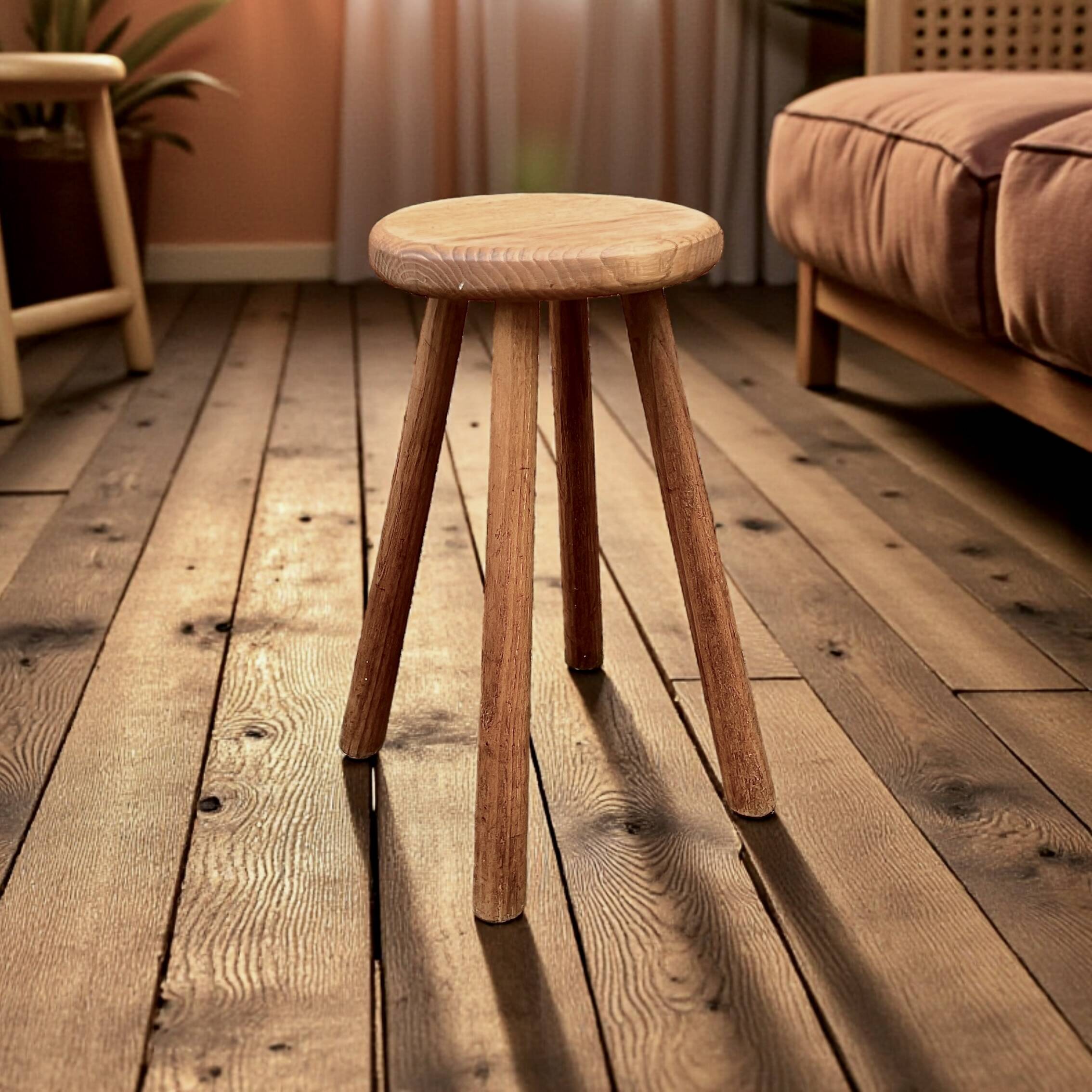 Antique solid wood four-legged stool – rustic & decorative piece