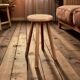 Antique solid wood four-legged stool – rustic & decorative piece
