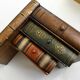 Pair of bookends (& secret boxes) in trompe l'oeil Stacked books