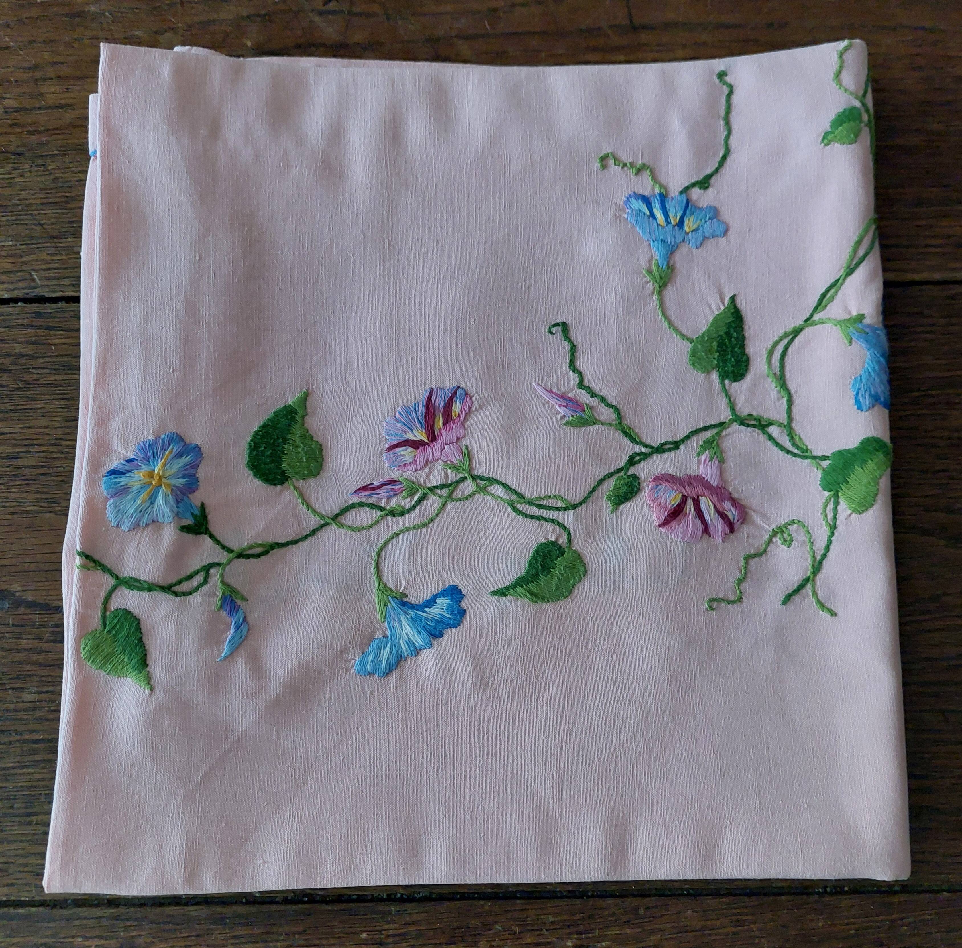 Antique pink cotton tablecloth with embroidered multicolored flowers