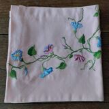 Antique pink cotton tablecloth with embroidered multicolored flowers