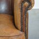Characterful sheepskin leather club armchair with a luxurious, rustic appearance