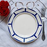 Old mismatched earthenware dinner plates