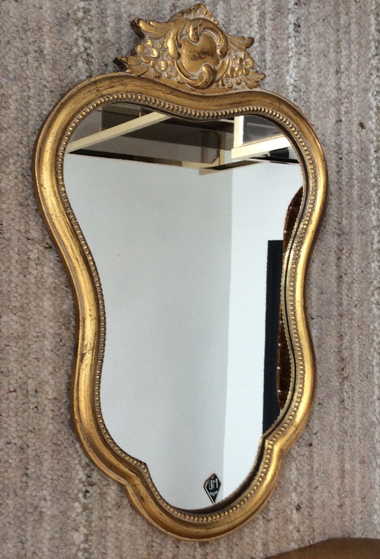 Gilded wooden mirror assembly and its wall console