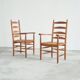 Set of 2 oak and wicker armchairs, mid-20th century.