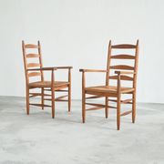Set of 2 oak and wicker armchairs, mid-20th century.