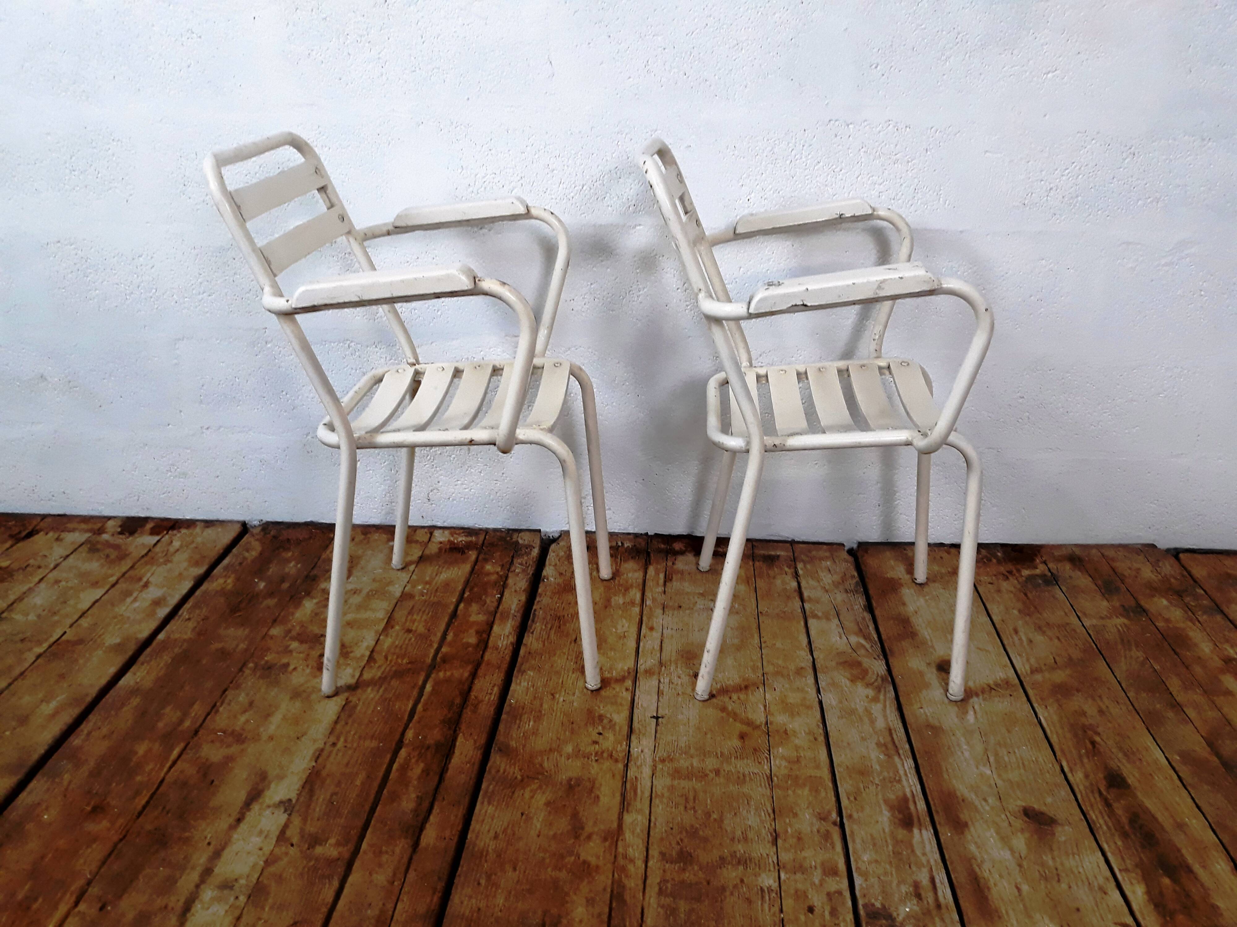 4 chairs and armchairs by Tolix