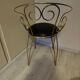 1960s brass and vinyl scroll chair