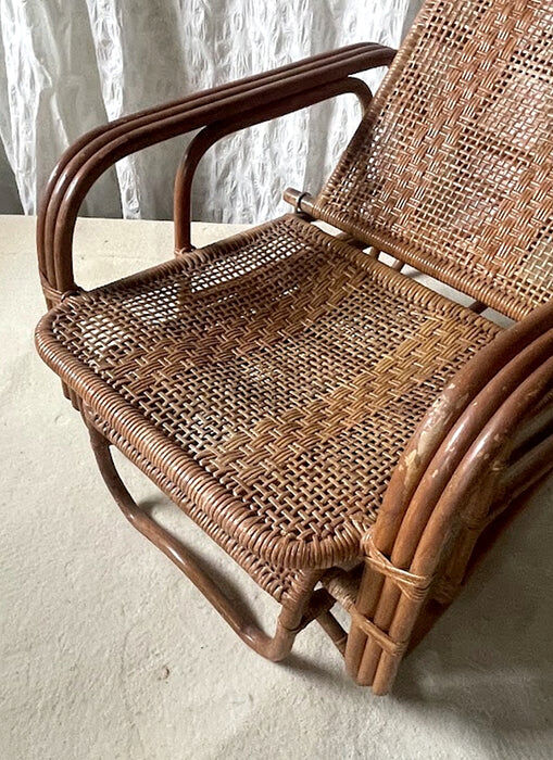 Mid-century adjustable rattan lounge chair with retractable footrest, Japan
