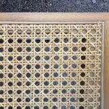 Wooden chair with caning in the style of Marcel Breuer.