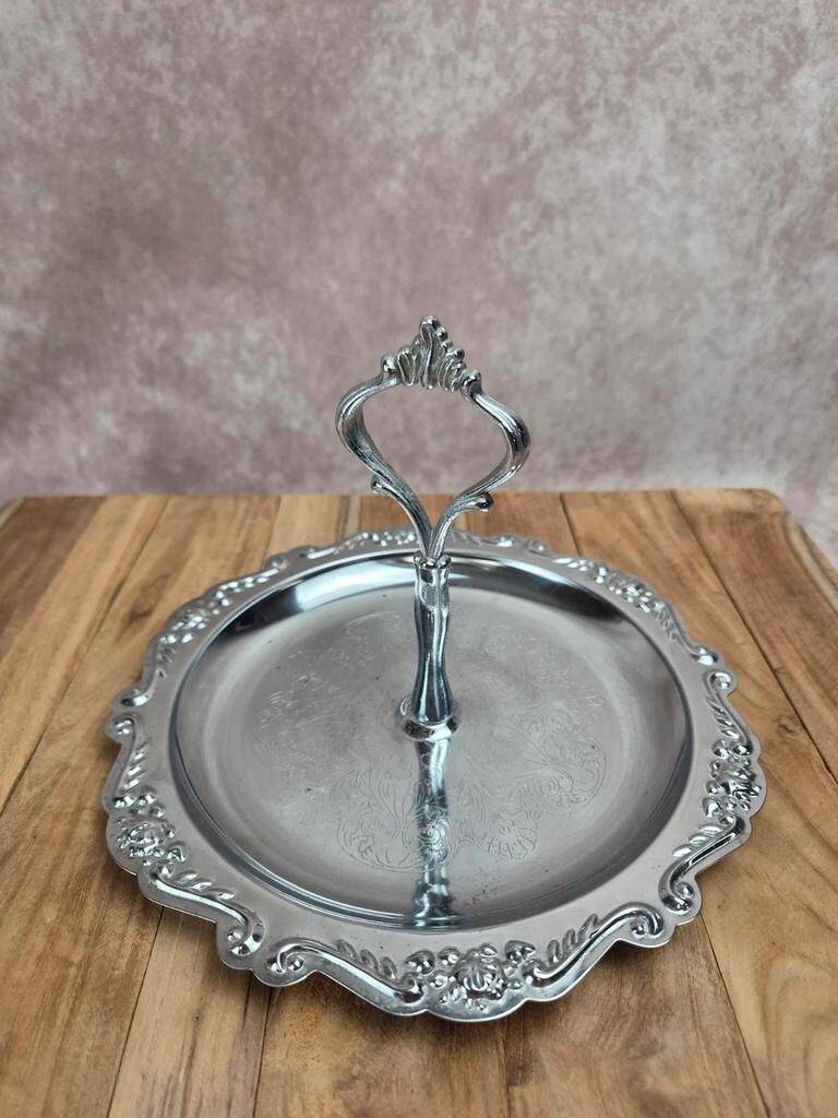 Small vintage round display stand in chrome metal – rococo style