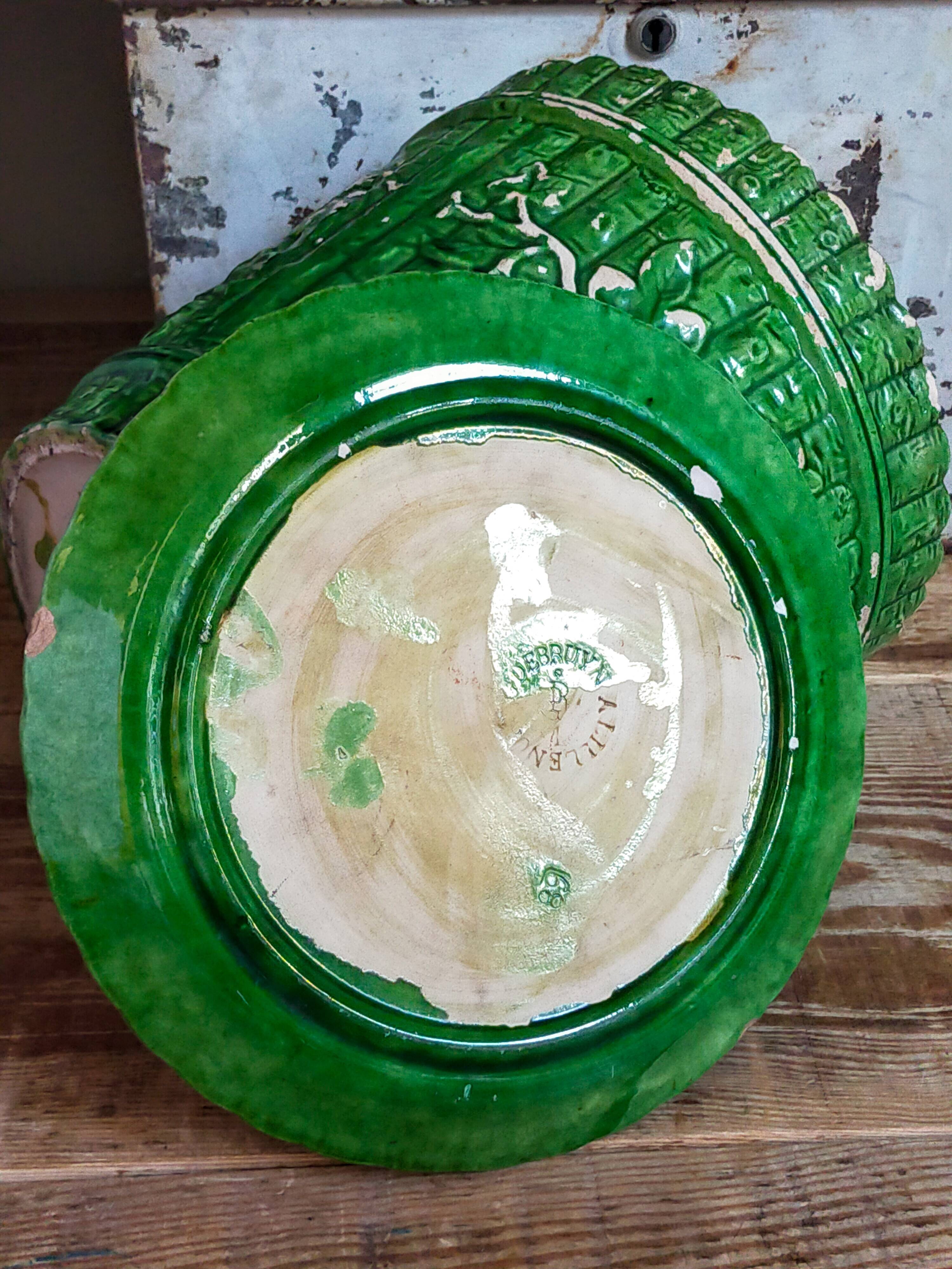 Flower pot and saucer in slip by G. De Bruyn 19th century