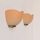 Vintage brass and orange glass wall sconces, France 1970.