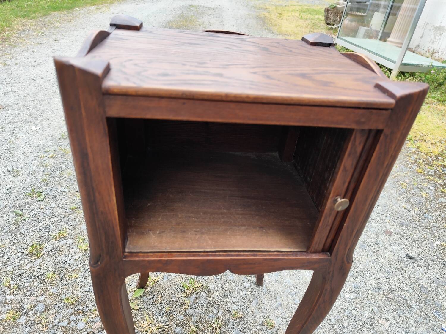 Pair of oak bedside tables with curtained niche doors