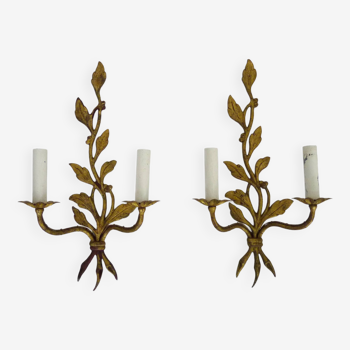 Pair of Maison Bagués wall lights decorated with foliage. 60s