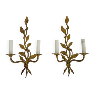 Pair of Maison Bagués wall lights decorated with foliage. 60s