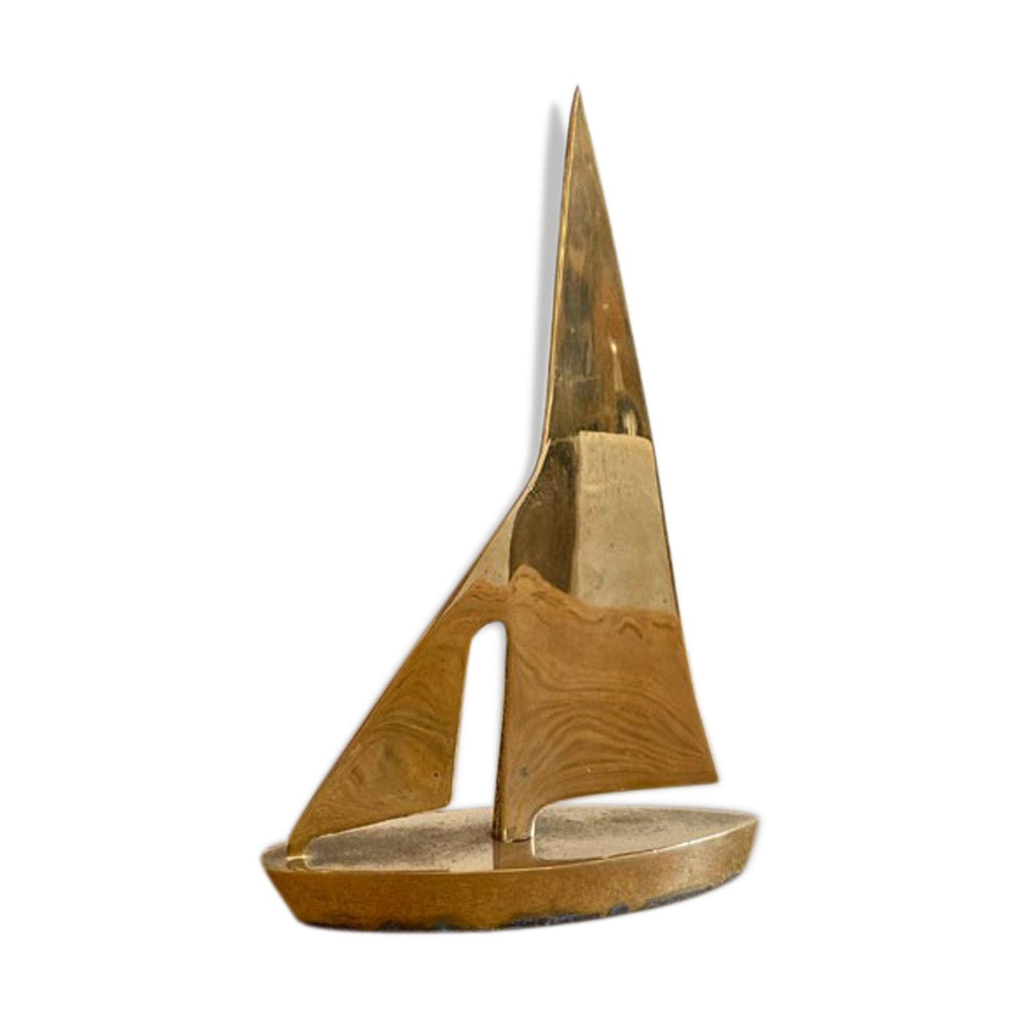 Golden brass sailboat