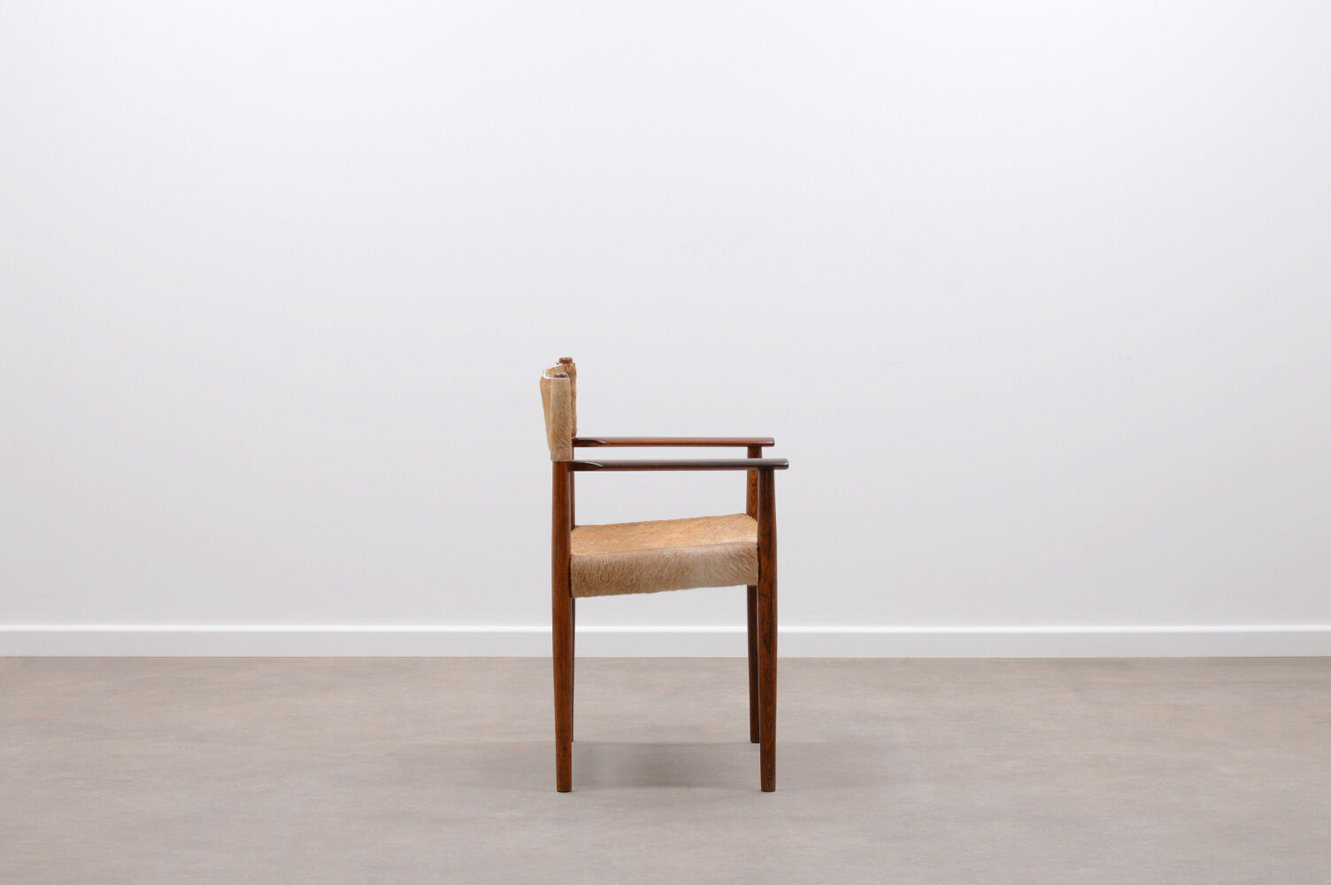 Rosewood and cow hide chair by Kurt Østervig for Sibast, 60s Denmark.