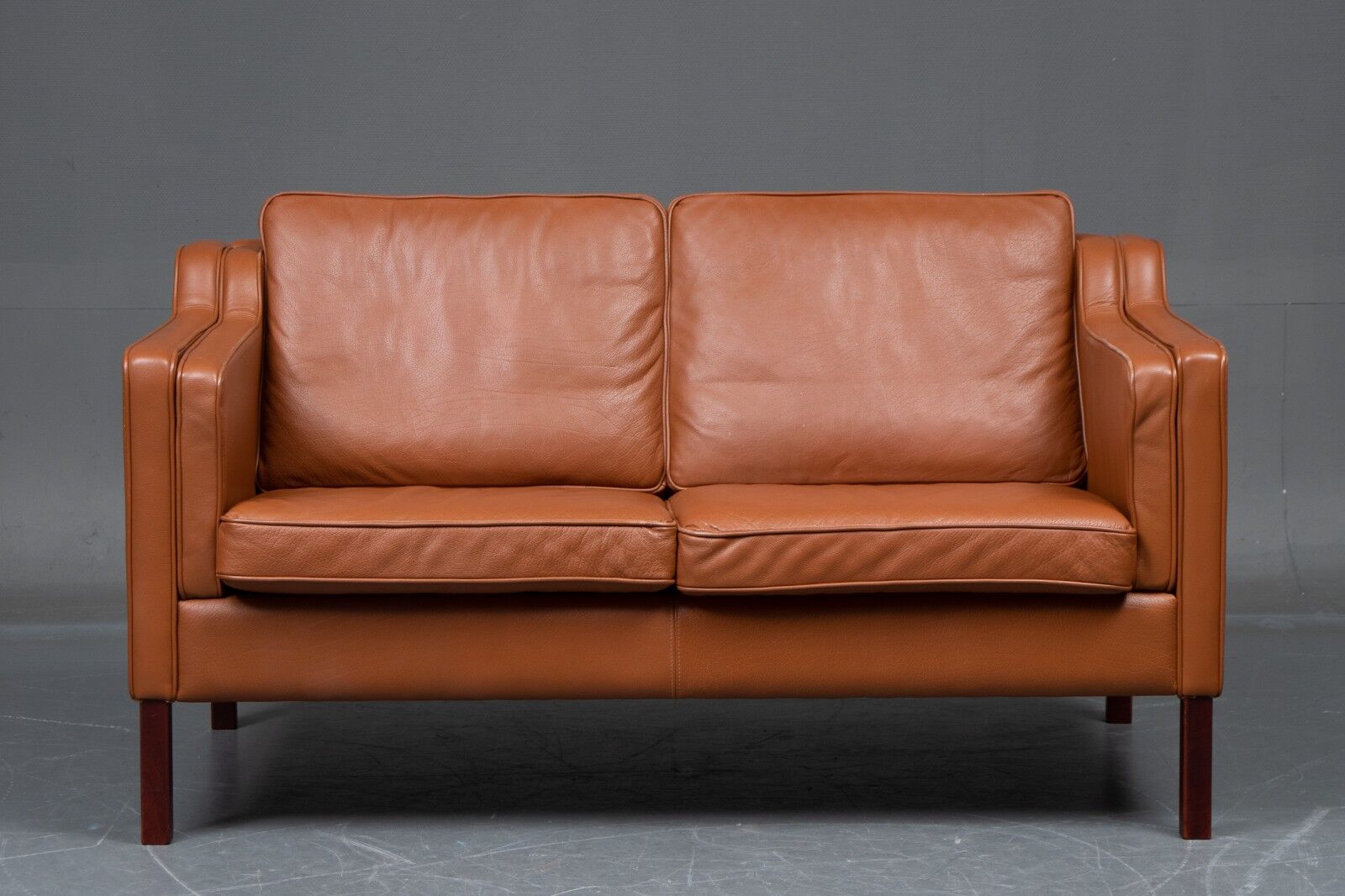 VINTAGE DANISH MID CENTURY STOUBY 2 PERSON SOFA IN COGNAC LEATHER