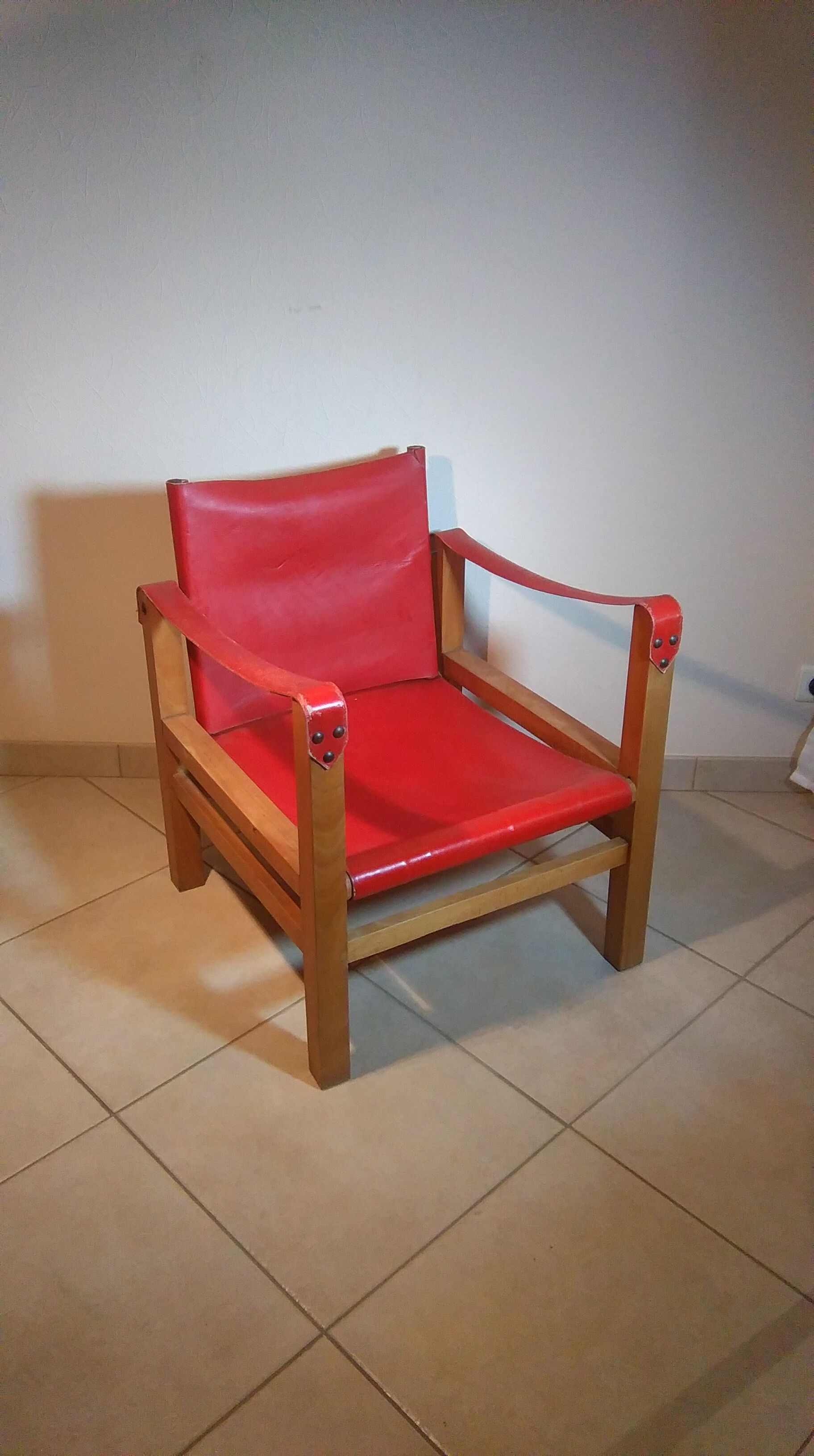 Wood and red leather armchair 60
