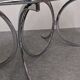 Oval dining table in chromed metal and smoked glass, Italy circa 1970