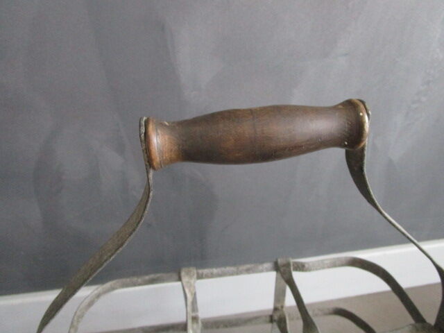 Antique metal bottle holder