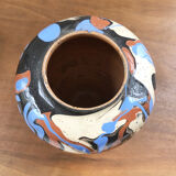 Vase dripping in varnished earth