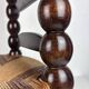 Brutalist wood turned bobbin low rush chair n the style of Charles Dudouyt