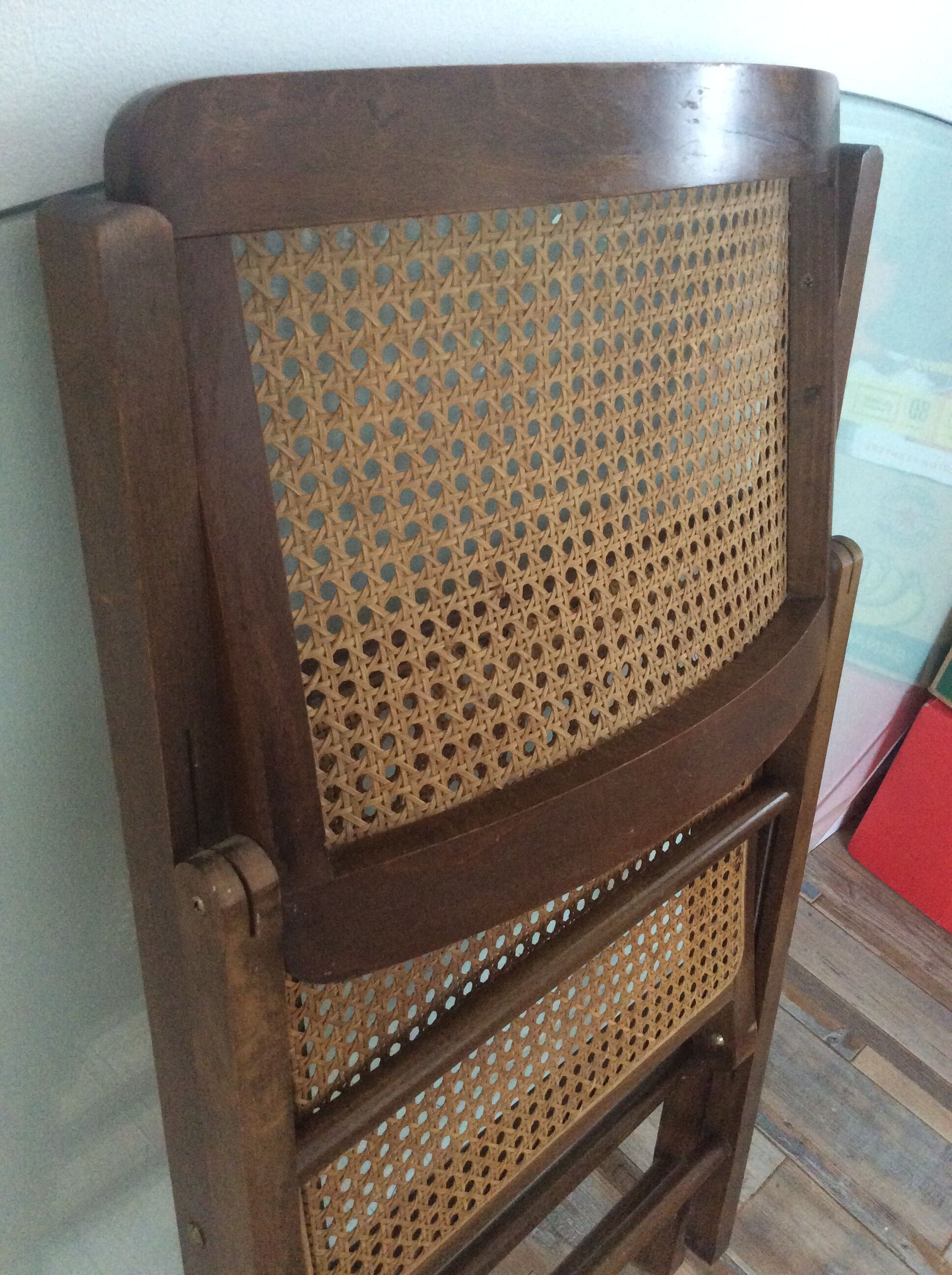 Folding chair caned from the 70s