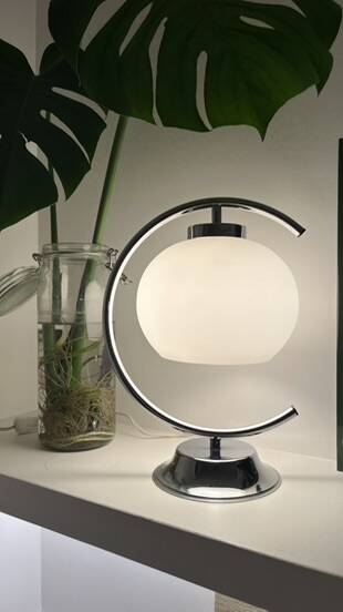 Glass and metal designer lamp