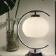 Glass and metal designer lamp