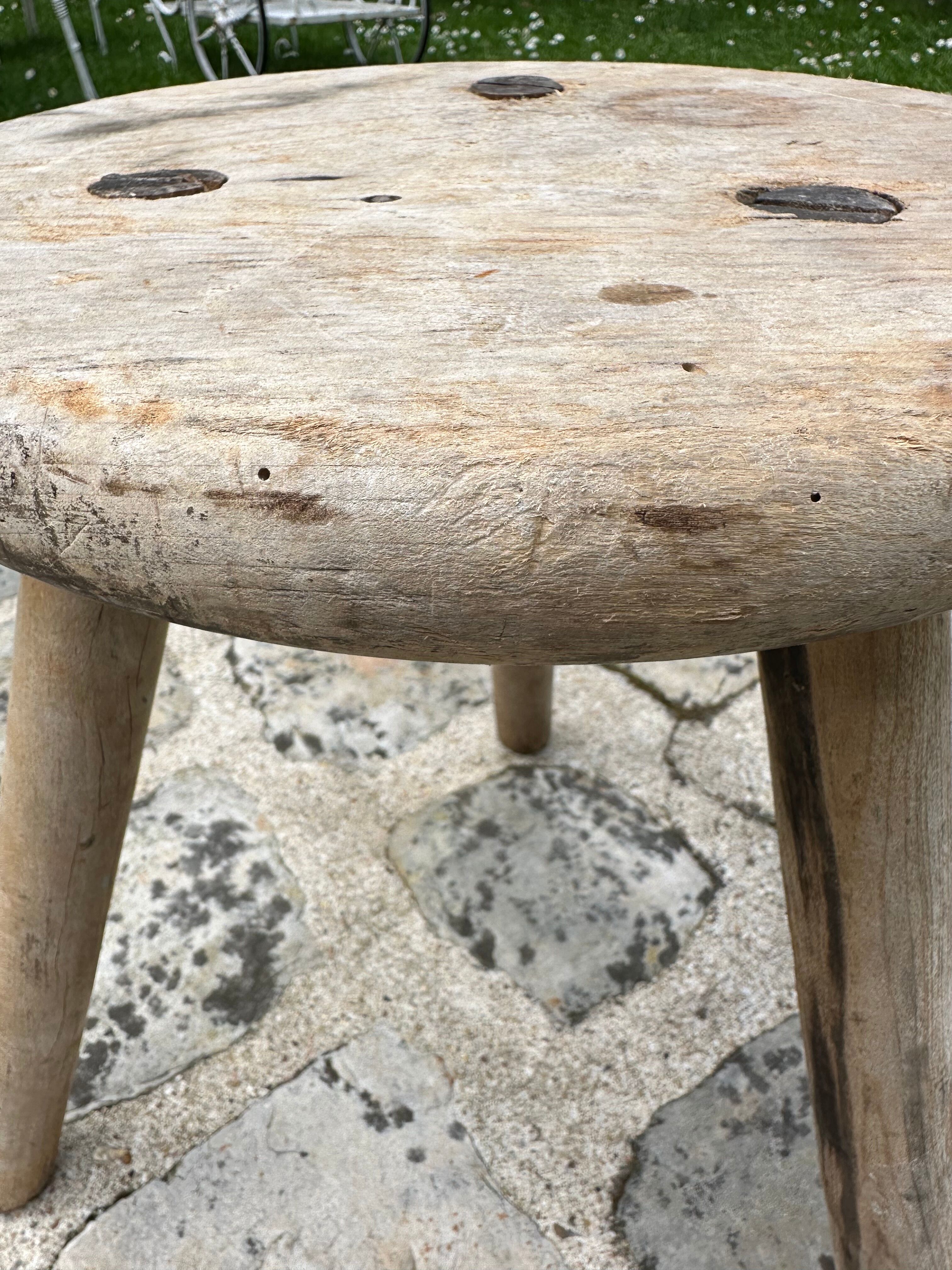 Tripod stool brutalist