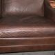 Fauteuil en cuir et bois de rose, années 1960