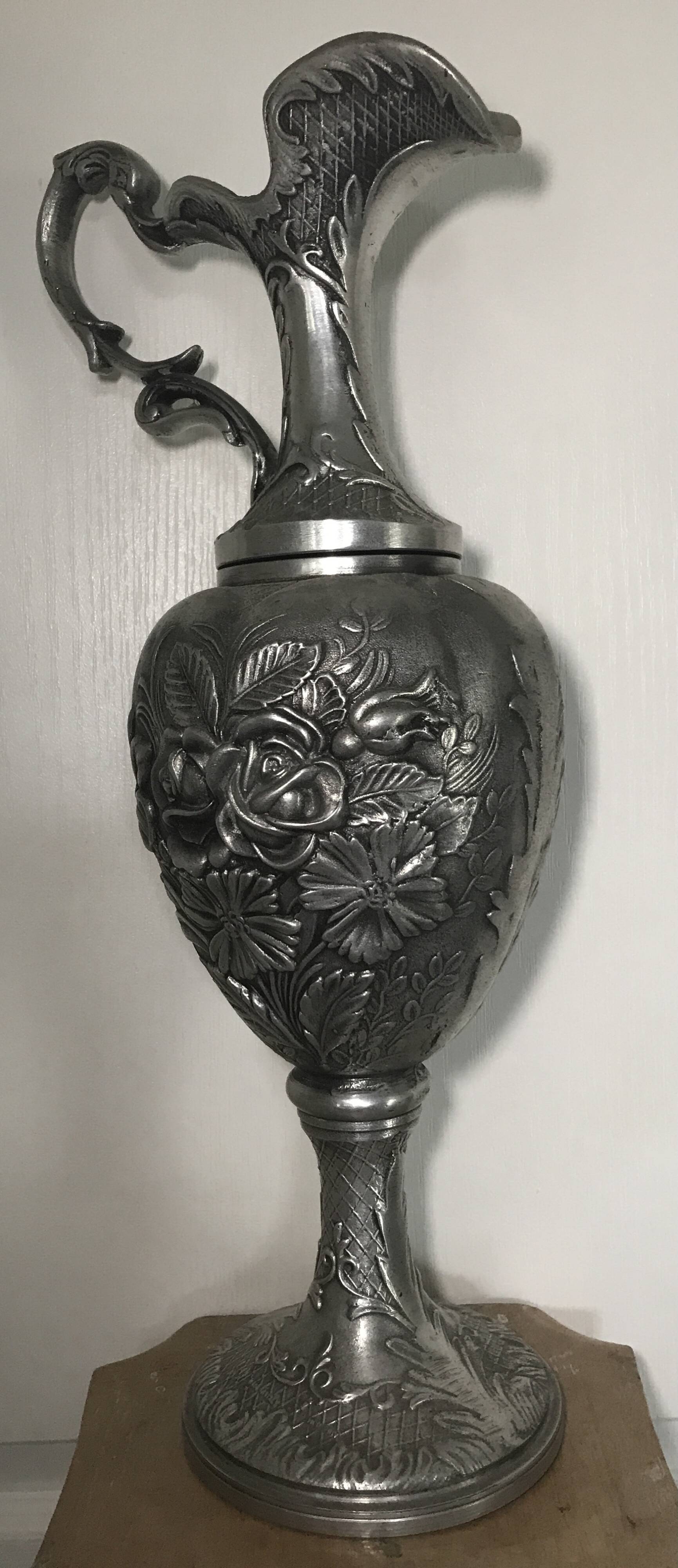Ewer, Mauro Manetti art foundry, floral embossed decoration and bird's head handle