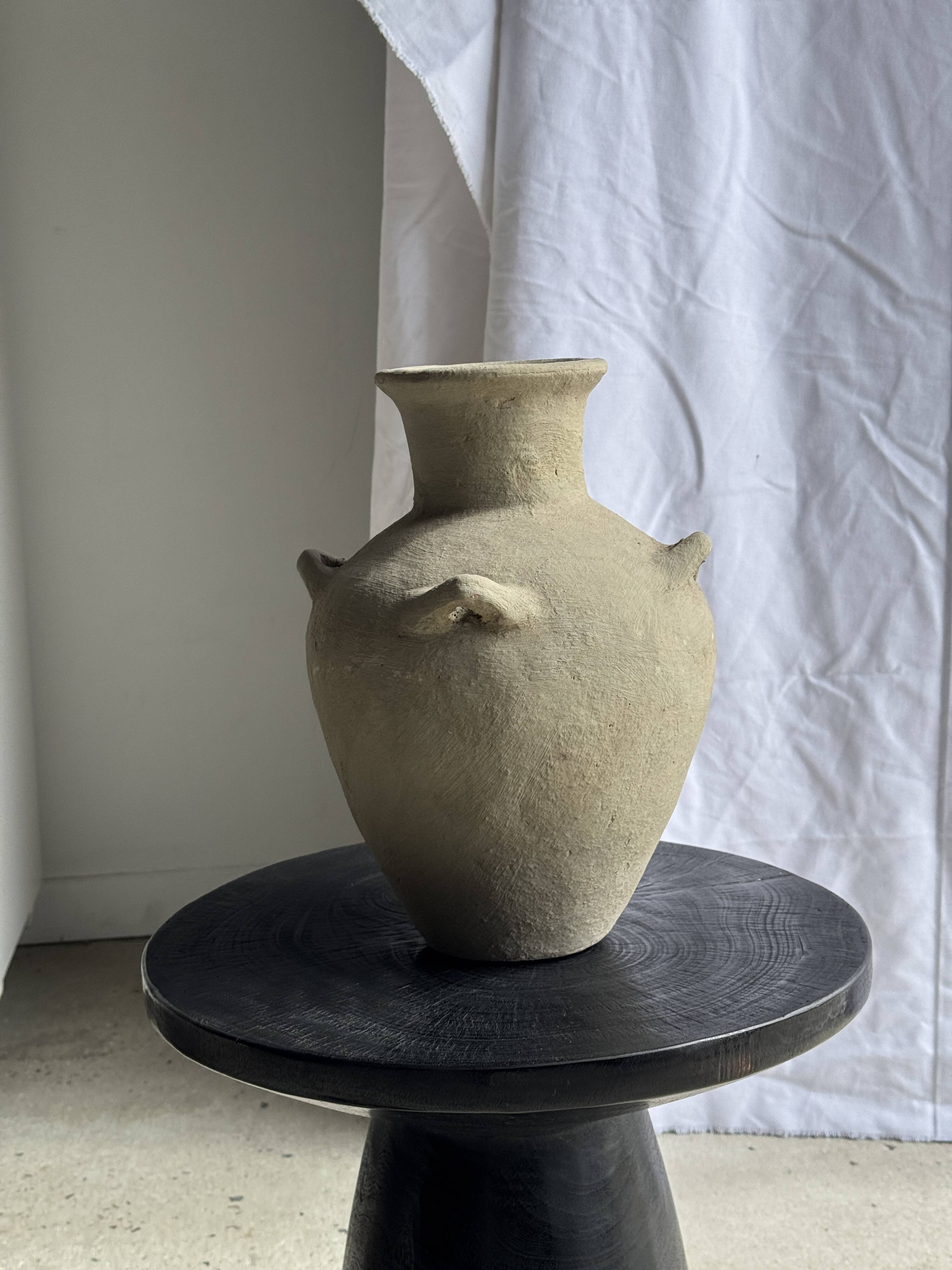 Black solid mango side table (monoxyle) with conical legs