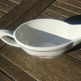 Porcelain gravy boat from the Orchies Moulin des Loups earthenware factory with lilac decoration