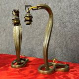 Paire de lampes cobra en bronze doré