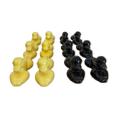 Box of 12 dog-shaped cutlery rests in yellow and black majolica.
