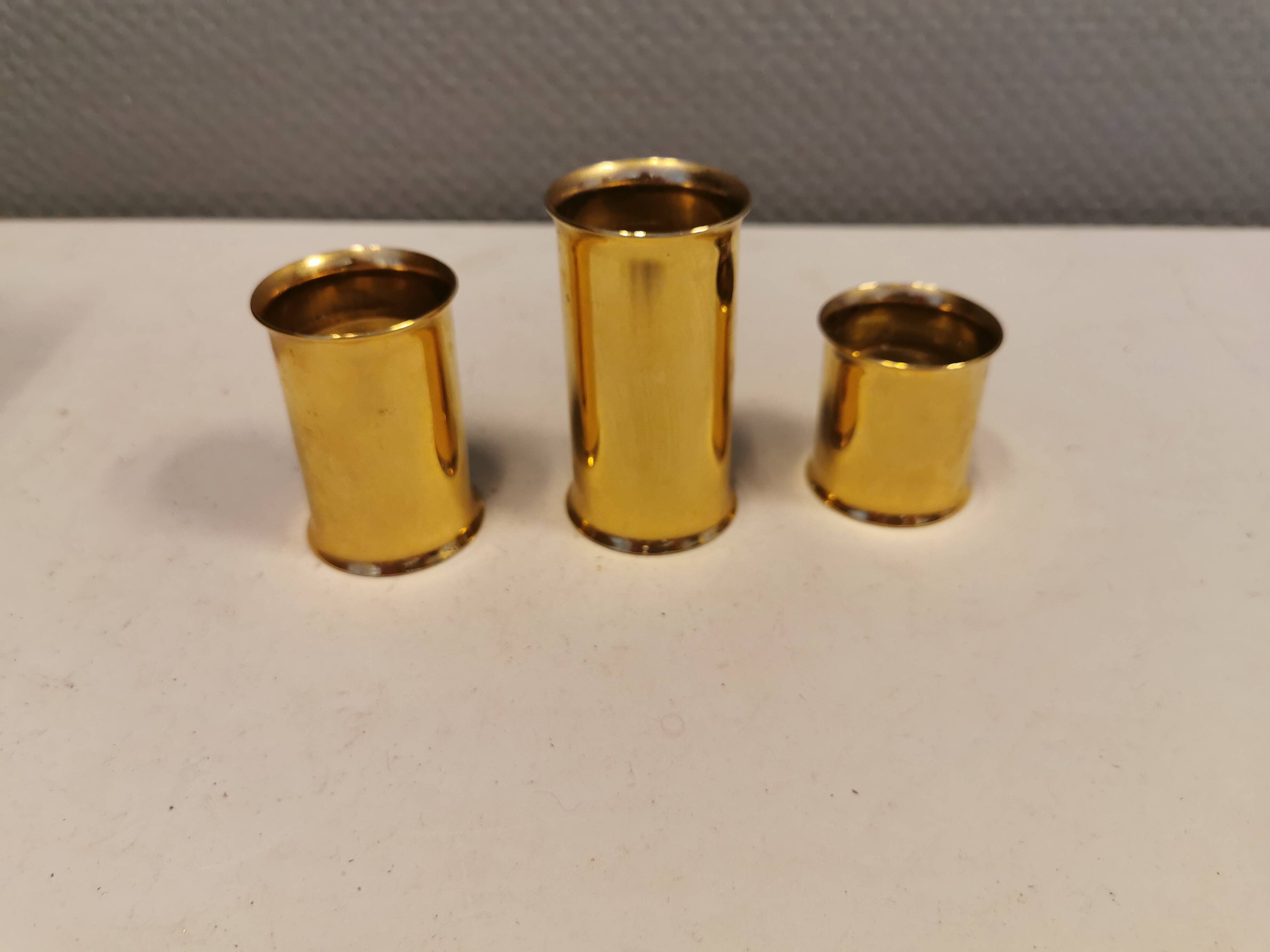 3 beautiful candle holders in 24 carat gold plating.  From Danish Altecco.