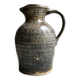 Large brutalist workshop carafe in glazed stoneware, signed, circa 1970.