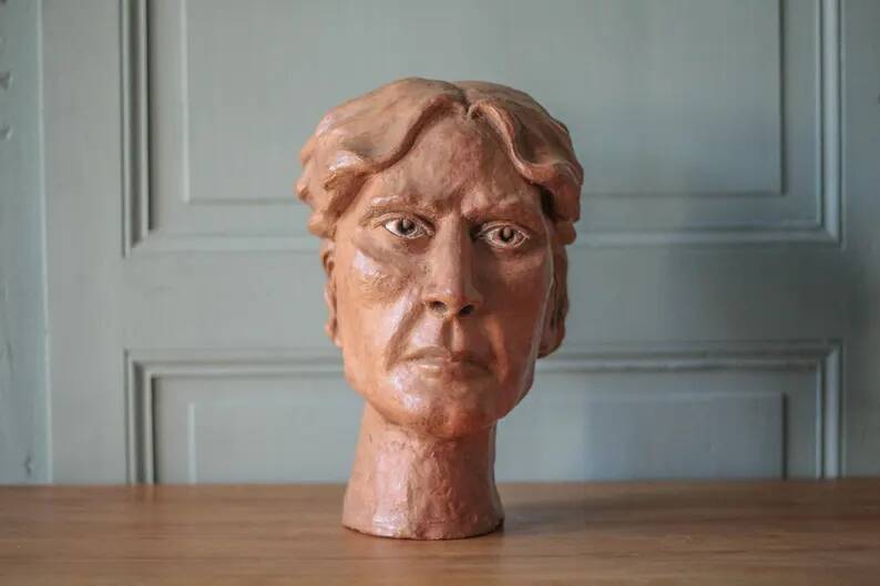 Sculpture signed Doloire, terracotta sculpture, sculpture of a man's head, collection, interior decoration.