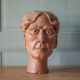 Sculpture signed Doloire, terracotta sculpture, sculpture of a man's head, collection, interior decoration.