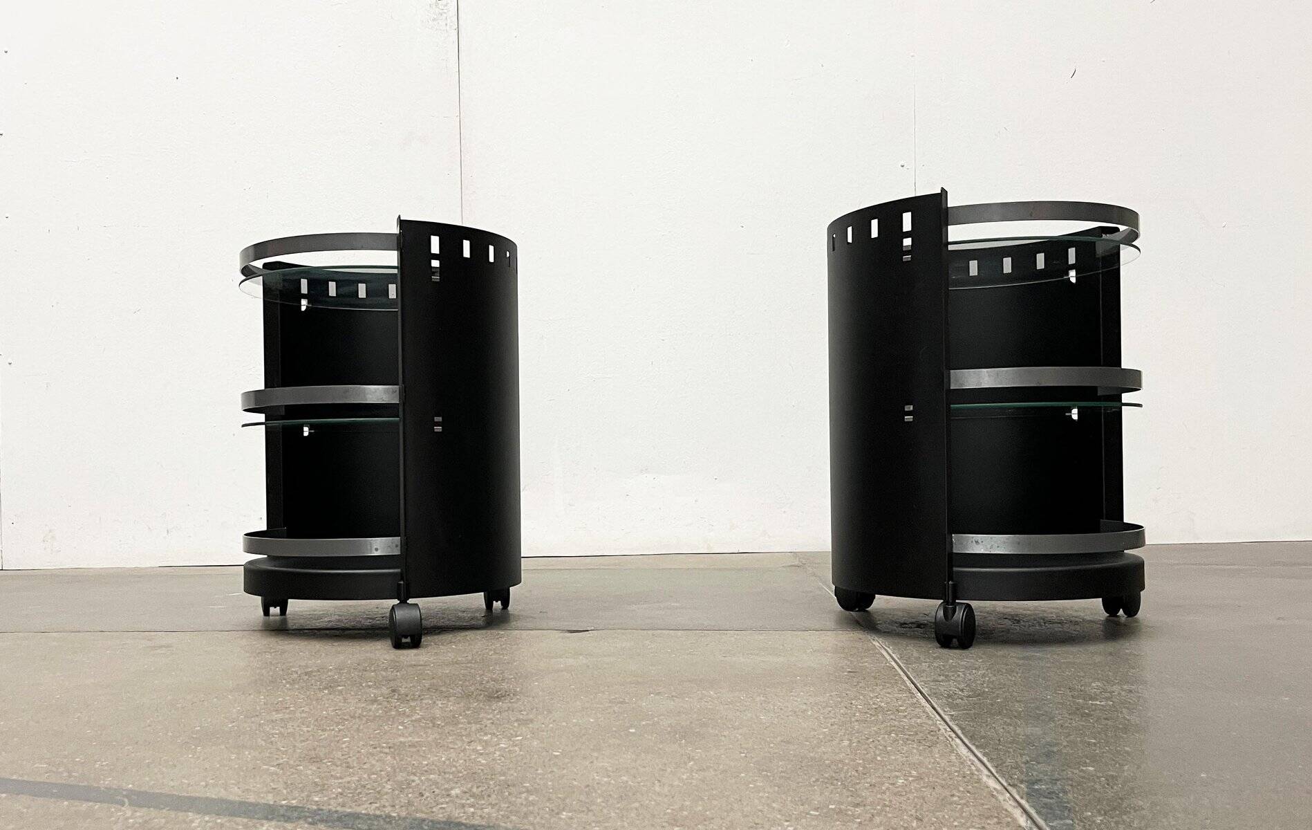 Postmodern German side tables in rolling metal and glass by D-Tec, 1980s, set of 2.