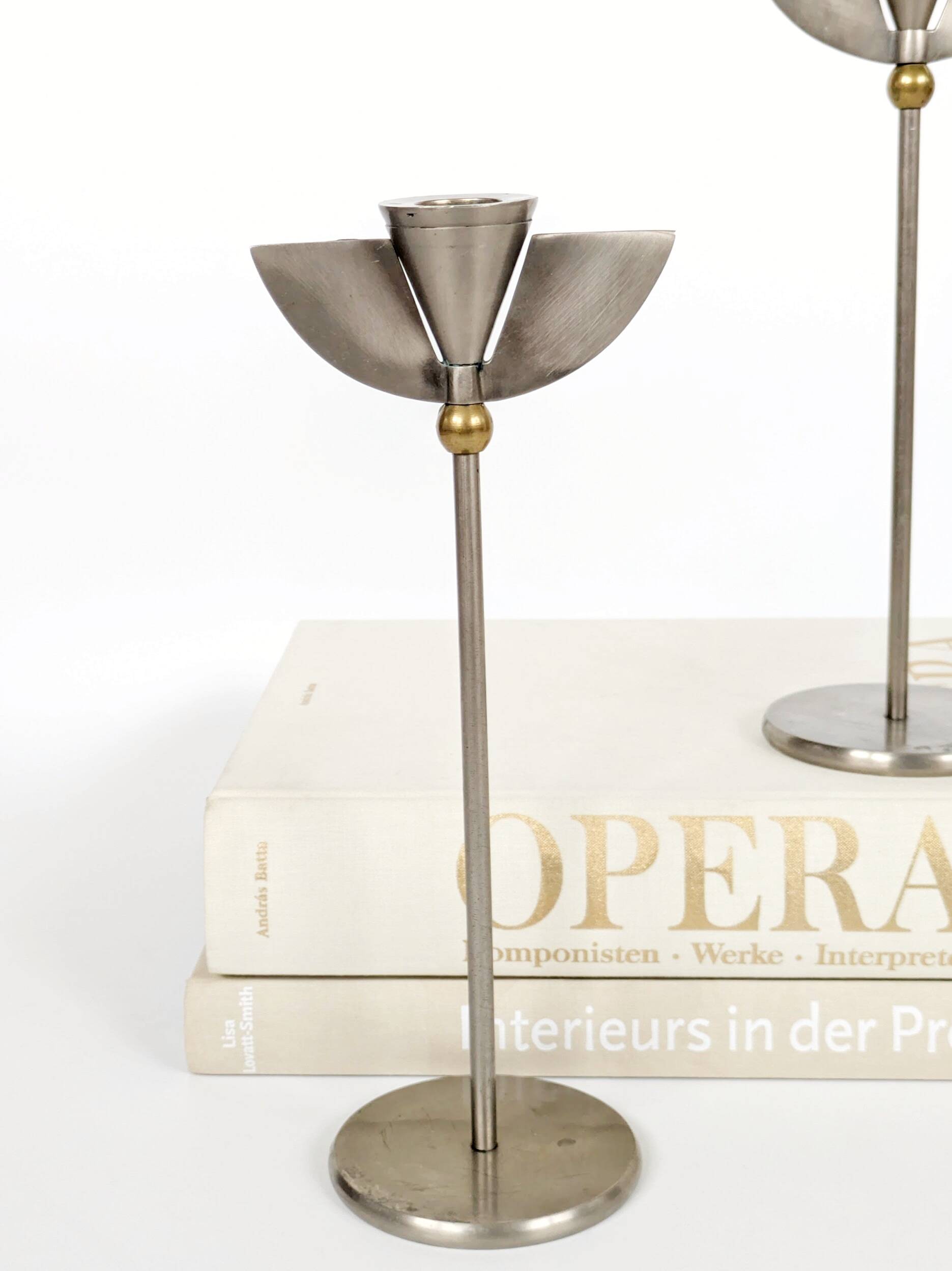 Pair of postmodern 1980s candlesticks, stainless steel and brass