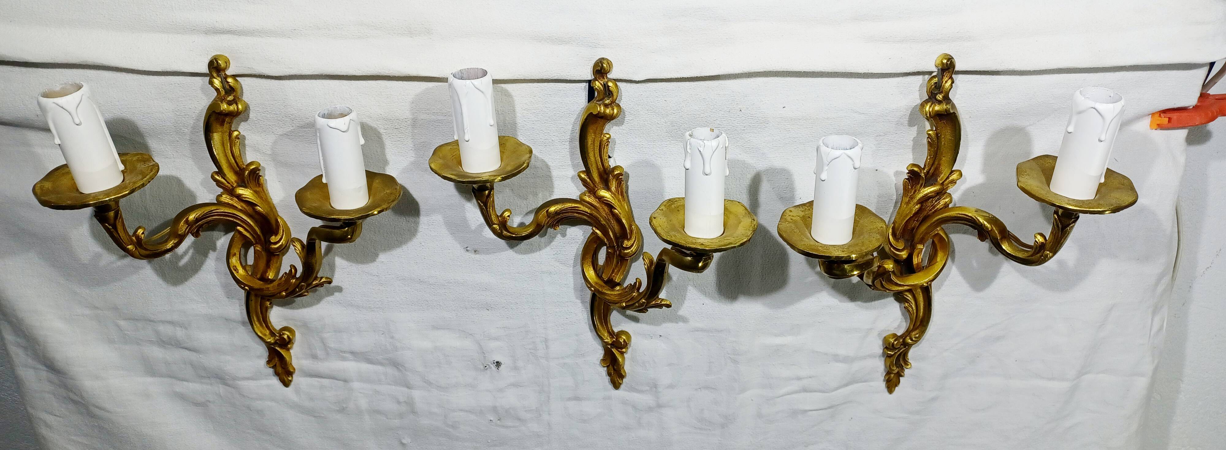 Bronze wall light triplet